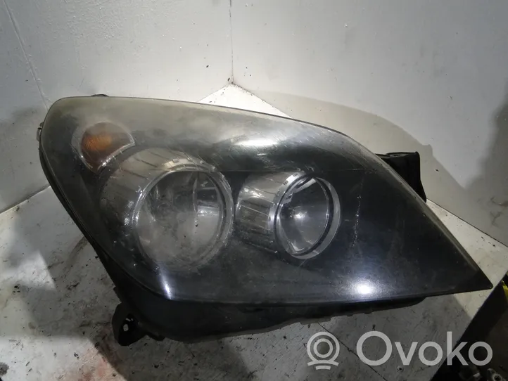 Opel Astra H Lampa przednia 1EG27037002