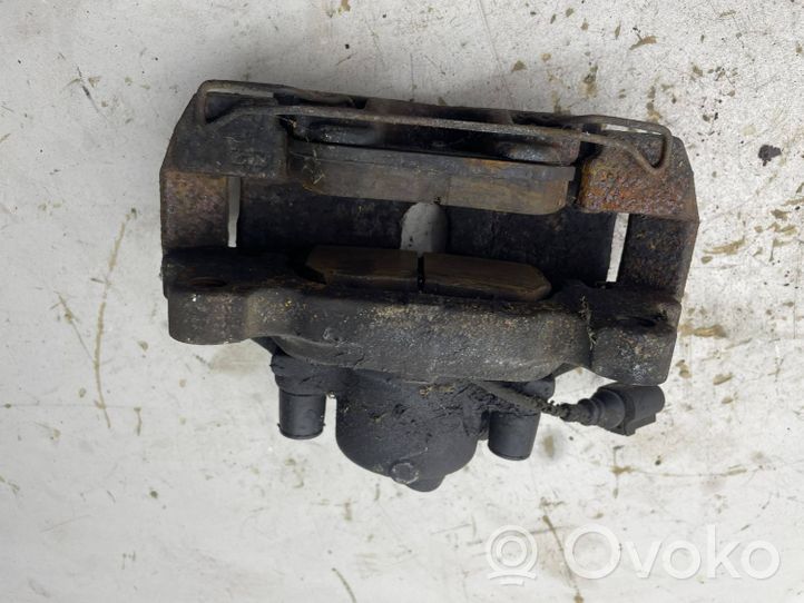 Volkswagen Touran II Front brake caliper 