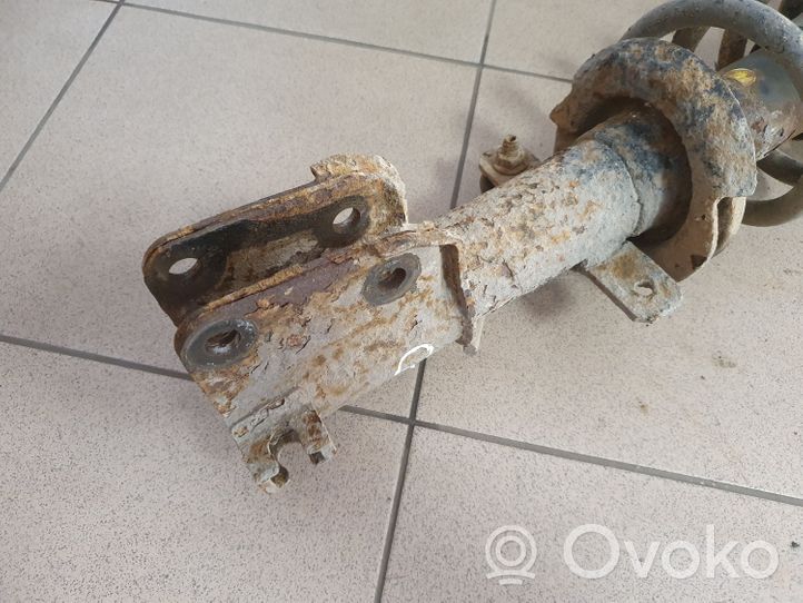 Opel Vivaro Front shock absorber with coil spring 