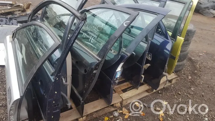 Opel Corsa B Drzwi tylne geltonos