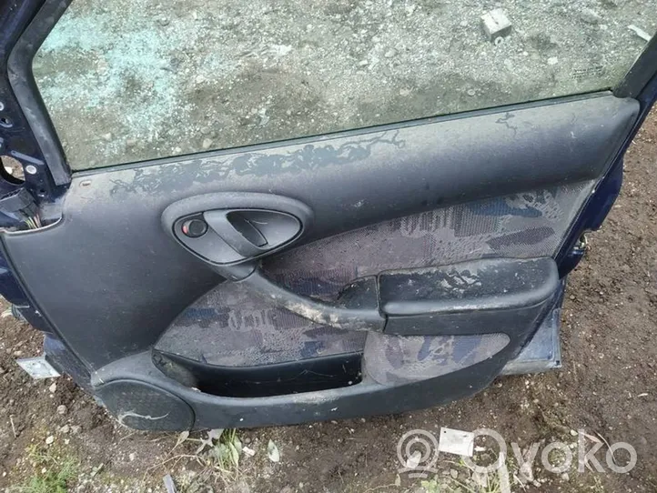 Citroen Xsara Drzwi przednie melynos