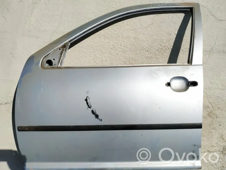 Volkswagen Golf IV Drzwi przednie pilkos
