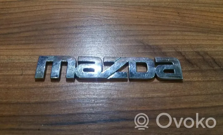 Mazda 323 Emblemat / Znaczek 