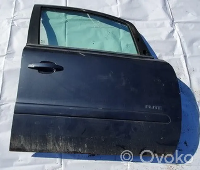 Opel Zafira B Drzwi przednie pilkos