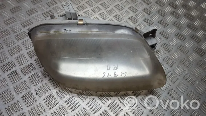 Mazda 323 Lampa przednia 11061703