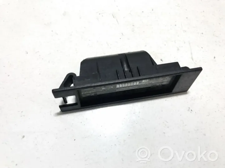 Opel Astra H Lampa oświetlenia tylnej tablicy rejestracyjnej 13139990