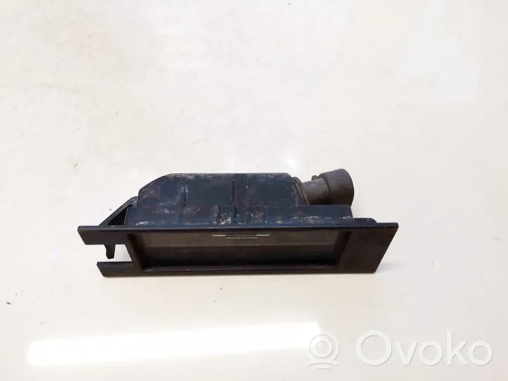 Opel Corsa C Lampa oświetlenia tylnej tablicy rejestracyjnej 09164143