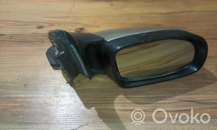 Opel Omega B1 Front door electric wing mirror e1010357