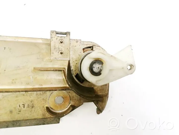 Opel Vectra B Front door lock (next to the handle) 