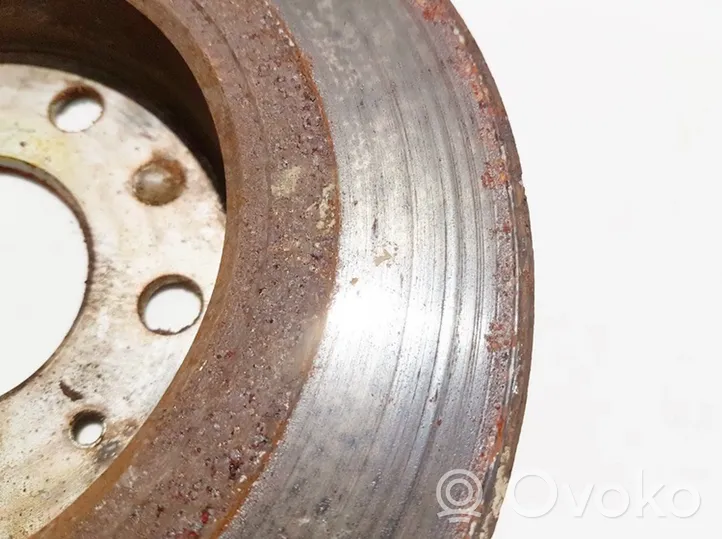 Opel Astra H Rear brake disc neventiliuojamas