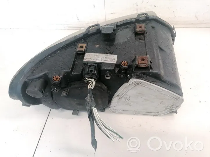 Chrysler Voyager Lampa przednia 04857703AB