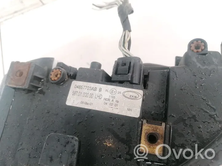 Chrysler Voyager Lampa przednia 04857703AB