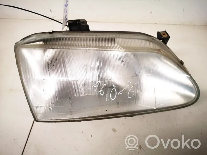 Renault Scenic I Lampa przednia 7701672735