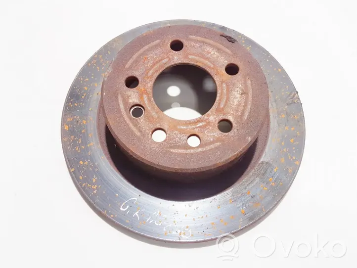 Opel Omega B1 Rear brake disc neventiliuojamas