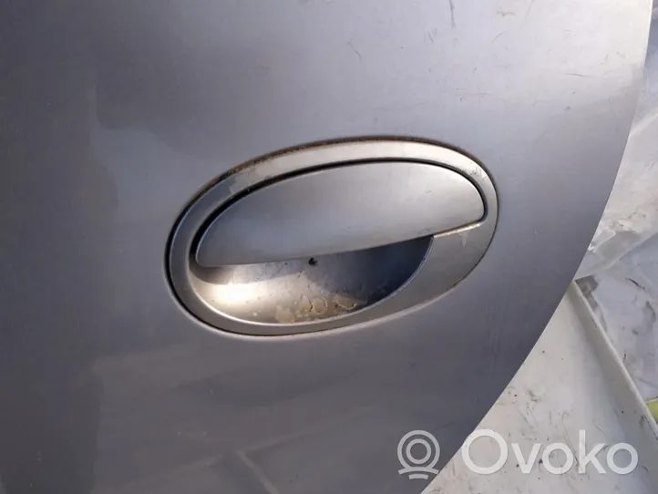 Opel Meriva A Poignée extérieure de porte avant 