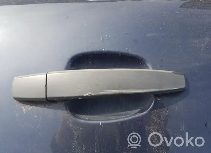 Opel Zafira B Front door exterior handle 