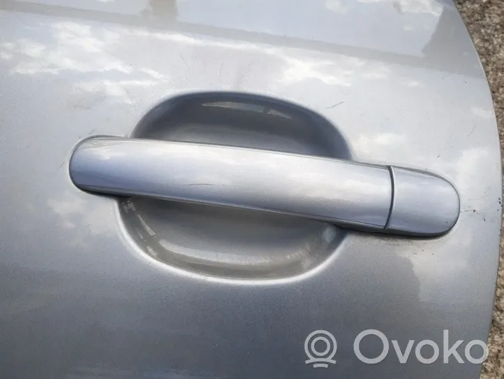 Volkswagen PASSAT B5.5 Front door exterior handle 