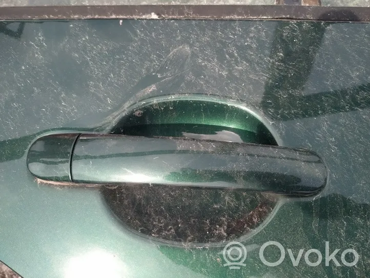 Opel Zafira B Front door exterior handle 