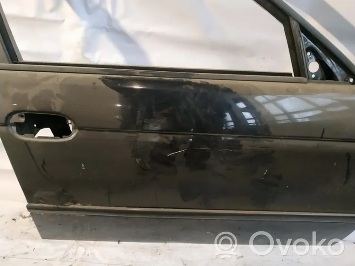 BMW 5 E39 Porte avant juodos
