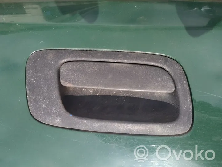 Opel Astra G Front door exterior handle 