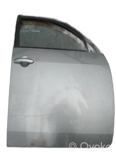 Nissan Primera Drzwi przednie pilkos