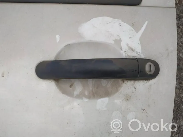 Volkswagen Golf IV Front door exterior handle 