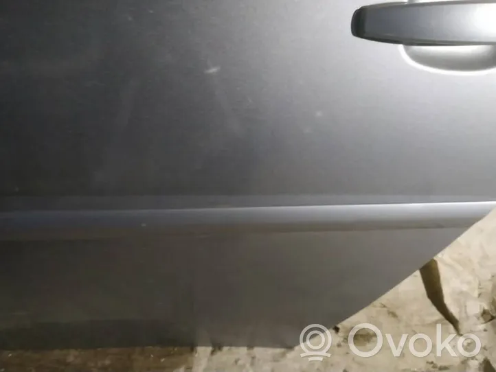 Opel Vectra C Listón embellecedor de la puerta delantera (moldura) 