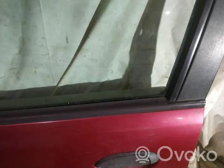 Renault Scenic I Listón embellecedor de la ventana de la puerta delantera 