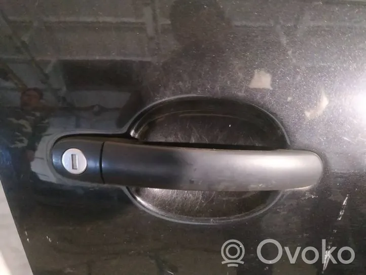 Volkswagen Polo IV 9N3 Front door exterior handle 