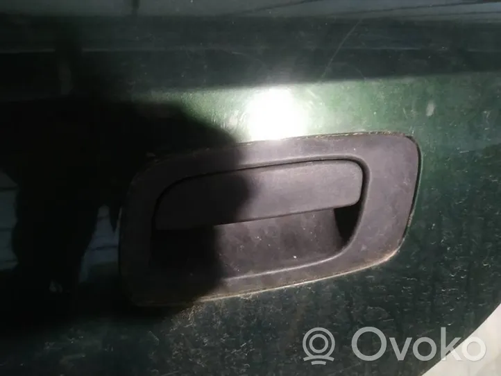 Opel Astra G Front door exterior handle 