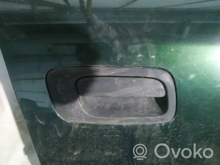 Opel Astra G Front door exterior handle 