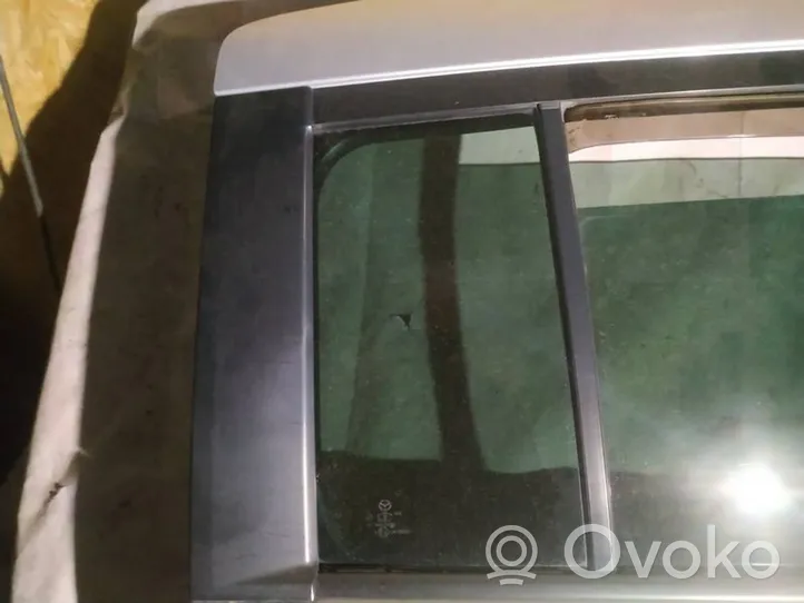 Mazda 5 Ventanilla de ventilación de la puerta trasera 