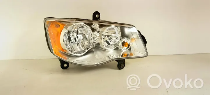 Chrysler Town & Country V Lampa przednia 05113336AE