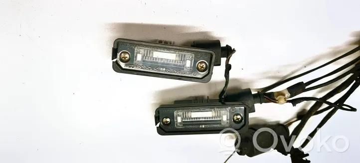 Volkswagen PASSAT B6 Lampa oświetlenia tylnej tablicy rejestracyjnej 1J6943021B