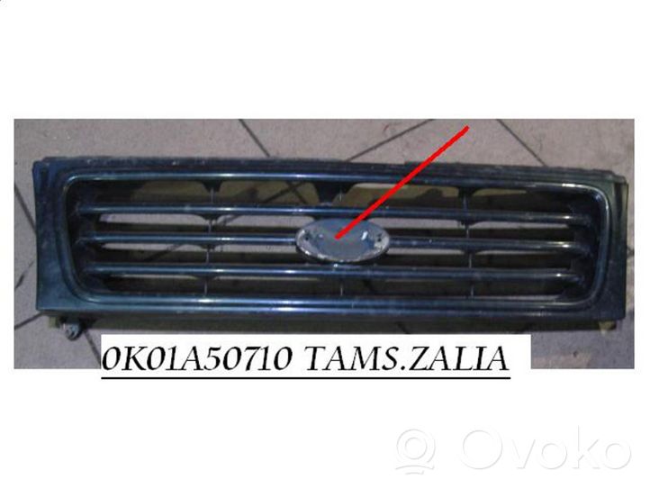 KIA Sportage Grille calandre supérieure de pare-chocs avant 0K01A50710