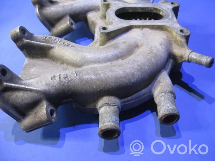 Volkswagen Golf II Intake manifold 038129713K