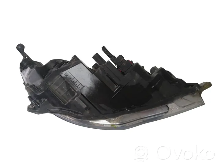 Opel Astra J Lampa przednia 1EG01001101