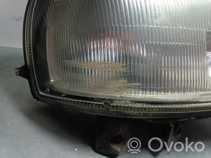 Opel Movano A Lampa przednia 7700352104-E