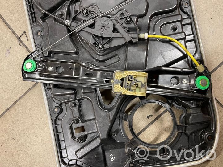 Volvo V40 Elektryczny podnośnik szyby drzwi przednich 933431