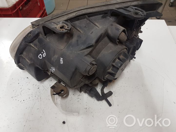 KIA Carens I Lampa przednia 0K2FA51020