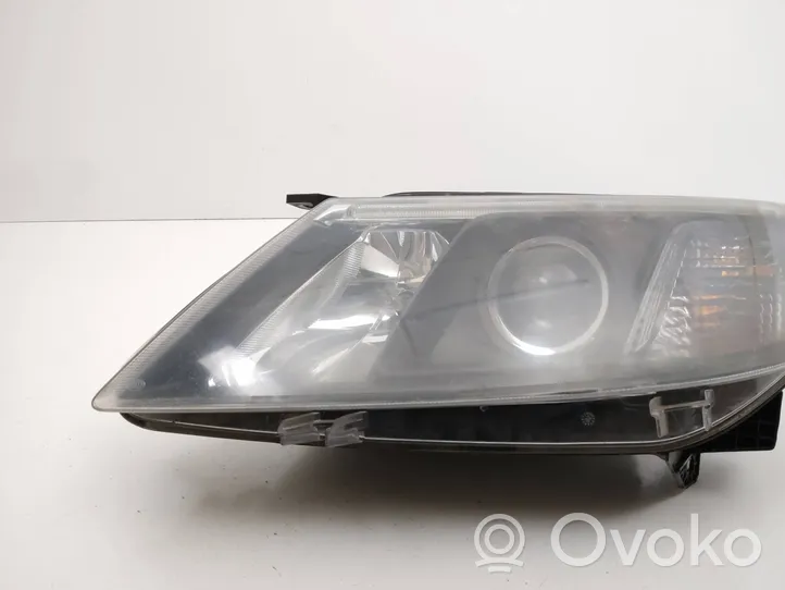 Saab 9-3 Ver2 Lampa przednia 12770137