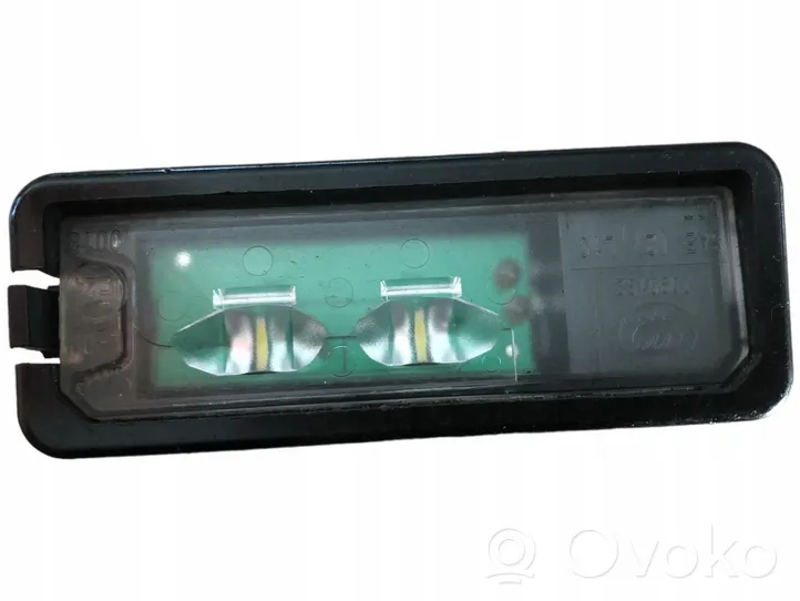 Volkswagen Golf IV Lampa oświetlenia tylnej tablicy rejestracyjnej 1K8943021C