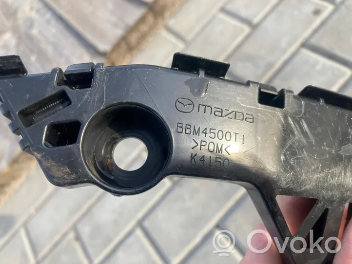 Mazda 3 Uchwyt / Mocowanie zderzaka przedniego BBM4500T1