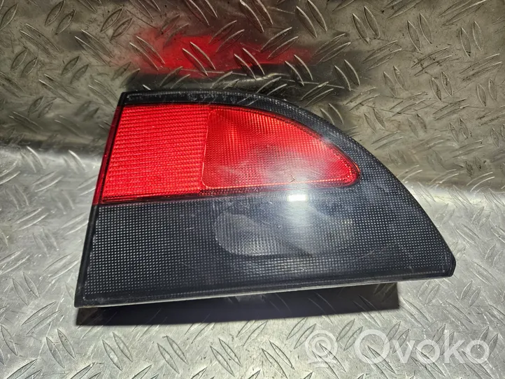 Renault Megane I Galinis žibintas dangtyje 7700838533