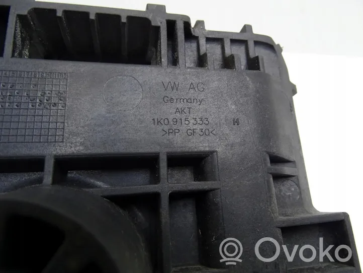 Skoda Octavia Mk2 (1Z) Mocowanie akumulatora 1K0915333H