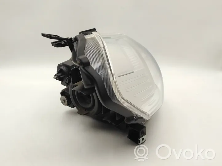 Suzuki SX4 Lampa przednia 10016684