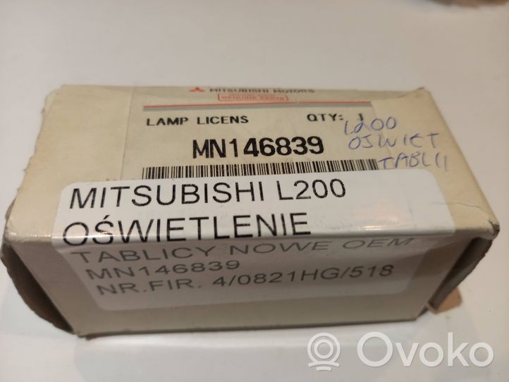 Mitsubishi L200 Освещение номера MN146839