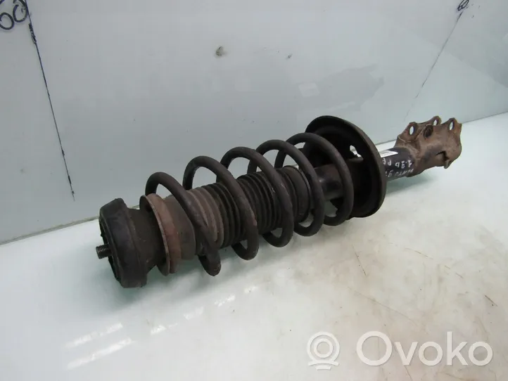 Volkswagen Vento Front shock absorber with coil spring 