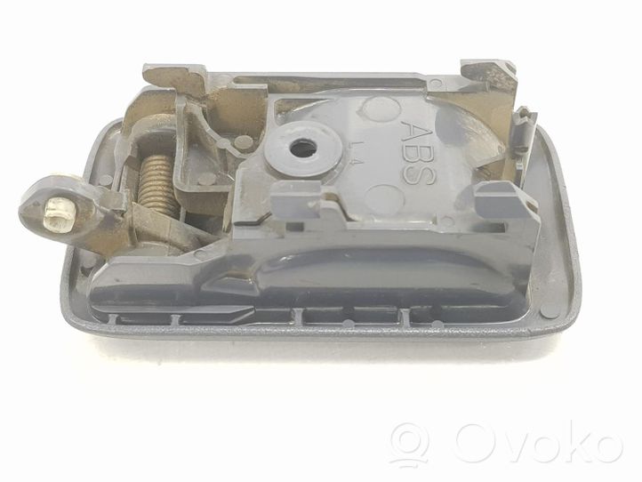 Toyota Land Cruiser (HDJ90) Klamka wewnętrzna drzwi tylnych 6920610070B1