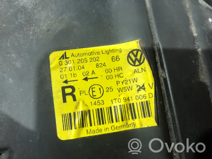 Volkswagen Touran I Lampa przednia 1305235778